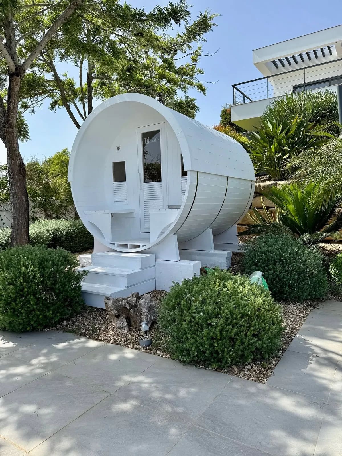Sauna exterior em jardim de moradia